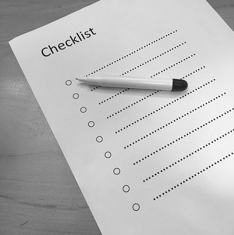 Paper checklist and pen